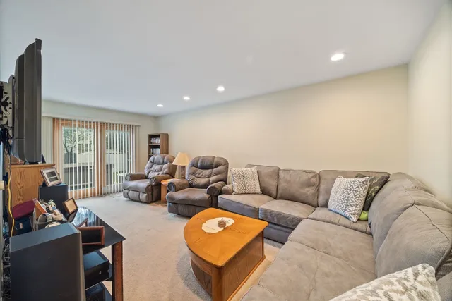 a living room with furniture and a couch