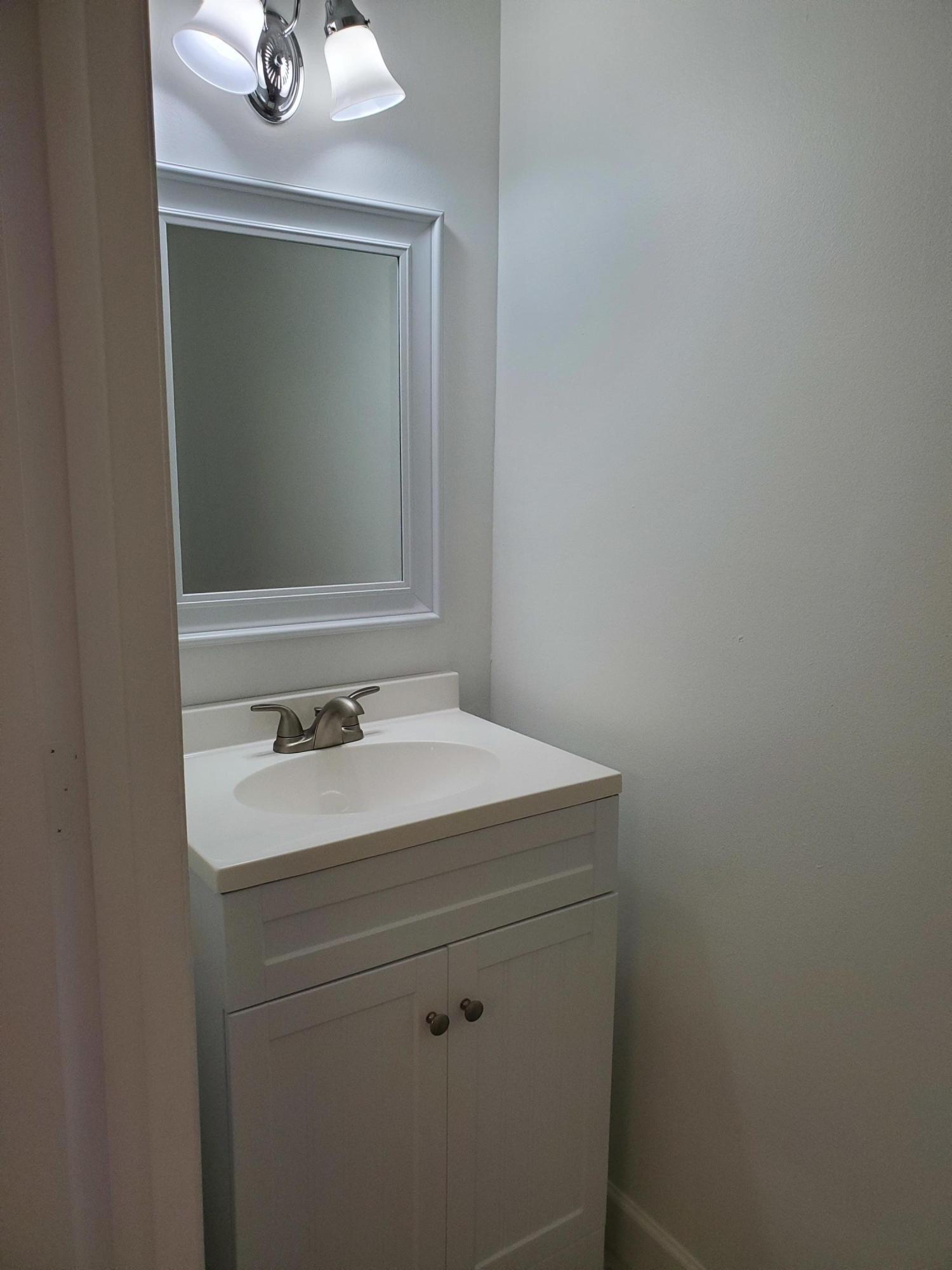 8957 Southwest 21st Court, Unit D Boca Raton, FL 33433 - Photo 11 of 25 1ST FLOOR BATH