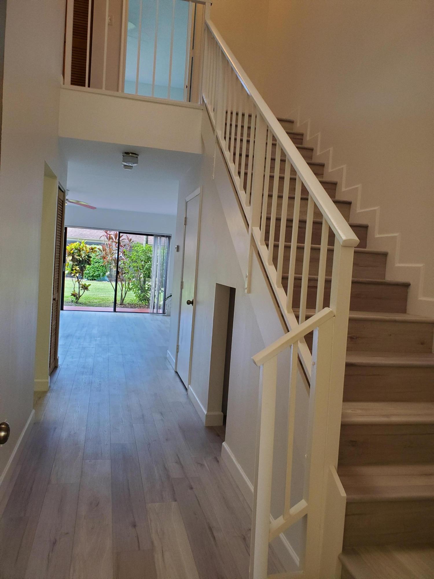8957 Southwest 21st Court, Unit D Boca Raton, FL 33433 - Photo 3 of 25 ENTRANCE AND STAIRS