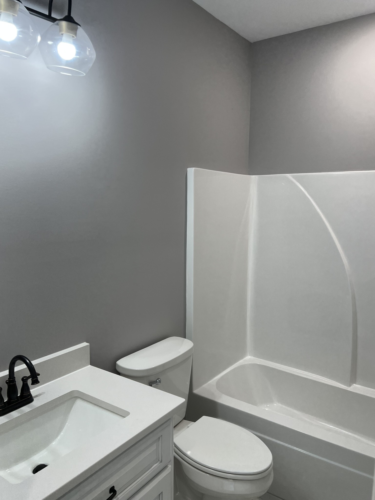 1504 Fall River Road Lawrenceburg, TN 38464 - Photo 12 of 15 a bathroom with a sink a toilet and shower