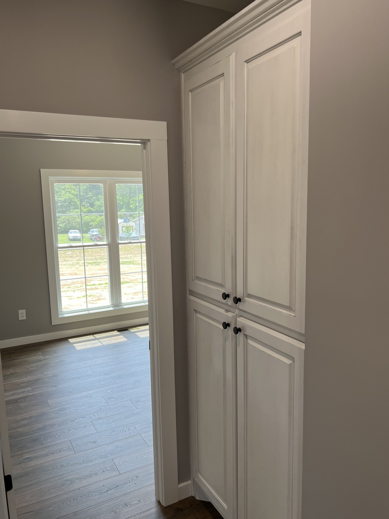 1504 Fall River Road Lawrenceburg, TN 38464 - Photo 13 of 15 an empty room with wooden floor and closet