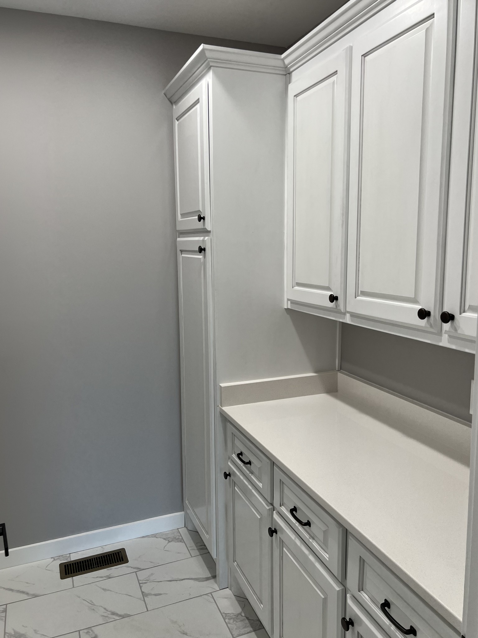 1504 Fall River Road Lawrenceburg, TN 38464 - Photo 7 of 15 a view of a kitchen with white cabinets