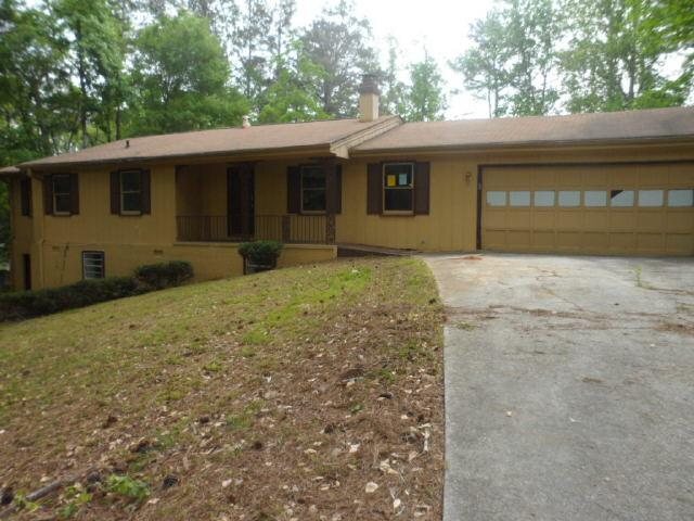 3140 Riders Trail Decatur, GA 30034 - Photo 1 of 1 a front view of a house with a garden