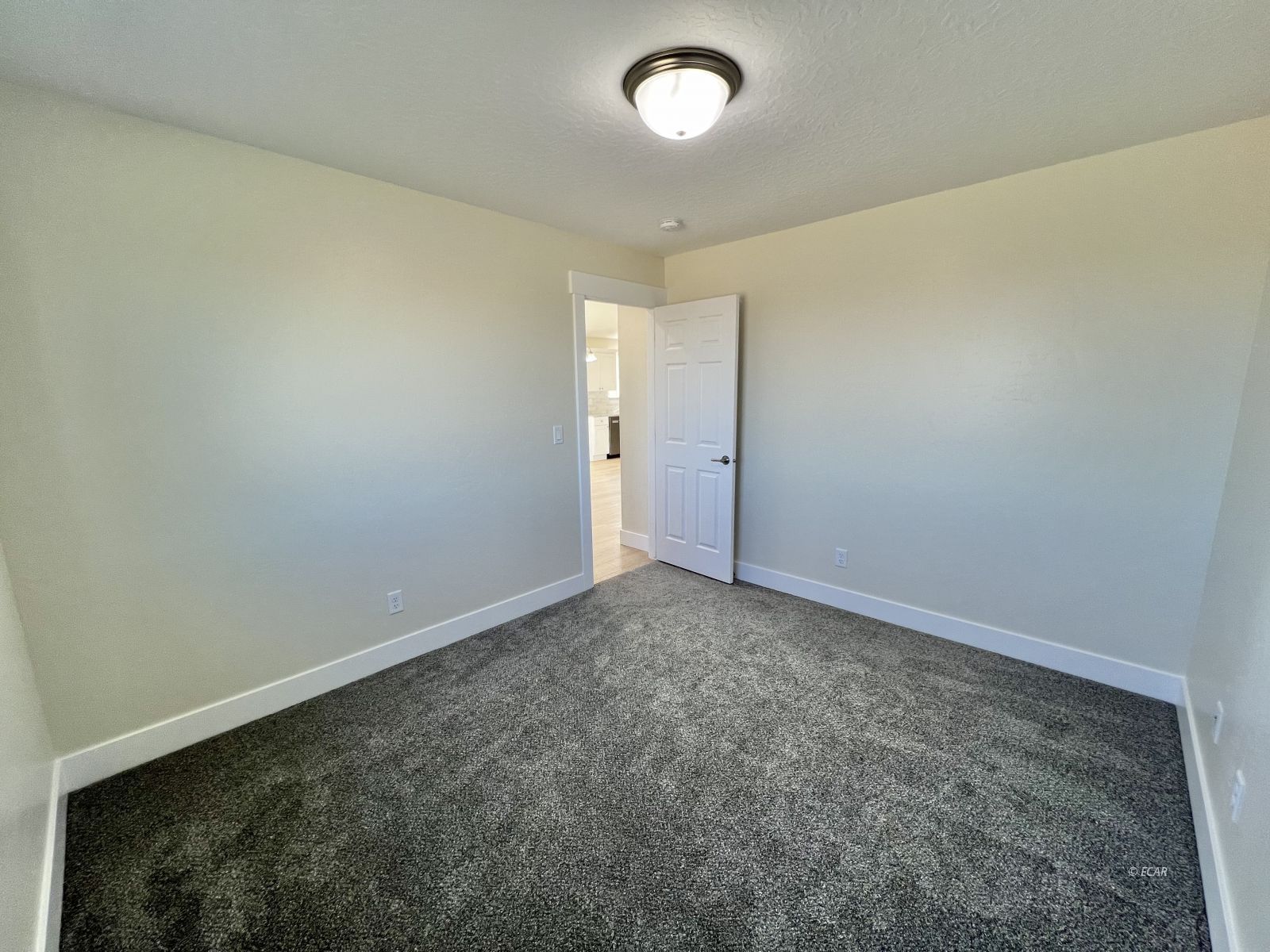 1096 Sun Vly Road Spring Creek, NV 89815 - Photo 12 of 31 an empty room with a empty space and a window