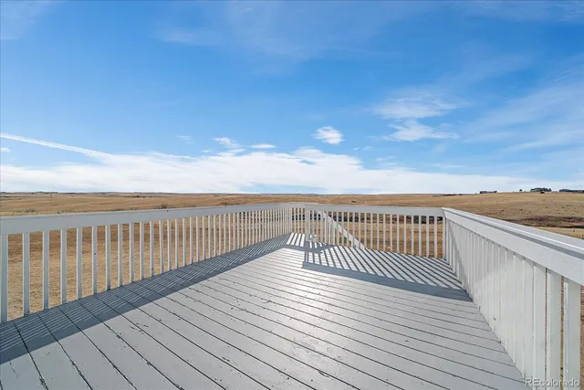 a view of a lake with a house