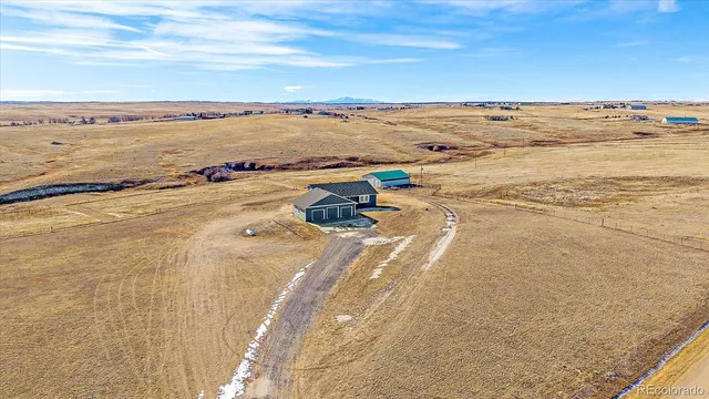 a view of mountain and field