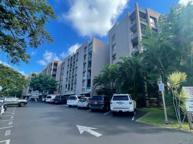 4310 Lower Honoapiilani Road, Unit 516 Lahaina, HI 96761 - Photo 1 of 16 a car parked in front of a building