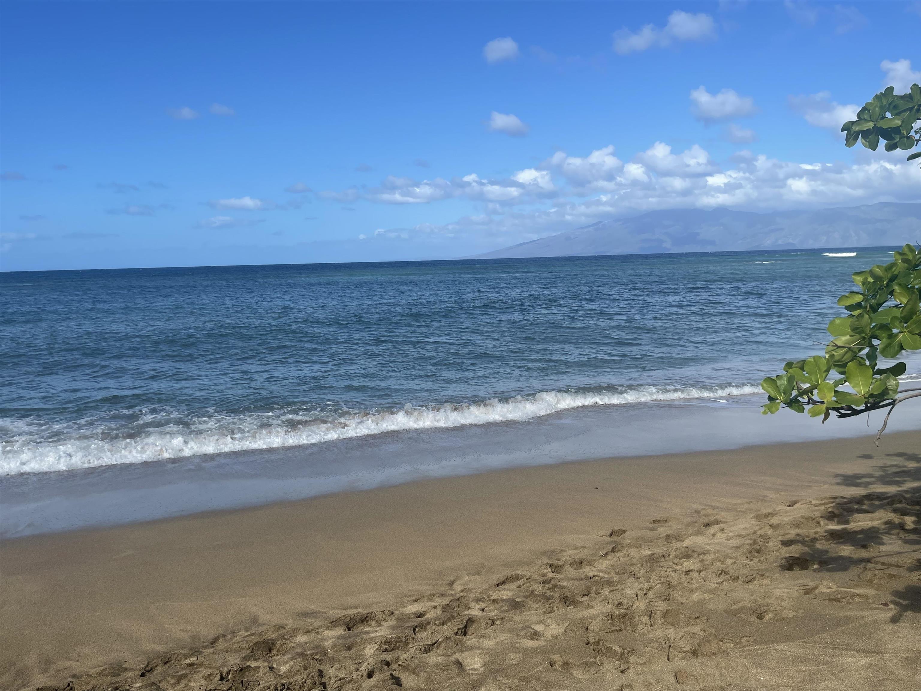4310 Lower Honoapiilani Road, Unit 516 Lahaina, HI 96761 - Photo 11 of 16 a view of an ocean beach