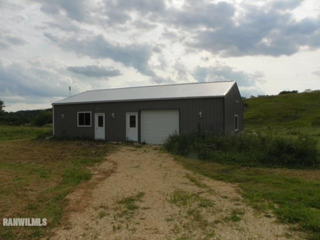 17658 Scenic Ridge Road Savanna, IL 61074 - Photo 2 of 24 a view of a house with a yard