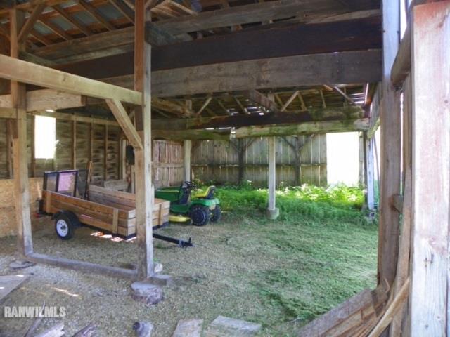 17658 Scenic Ridge Road Savanna, IL 61074 - Photo 22 of 24 a view of a house with a porch