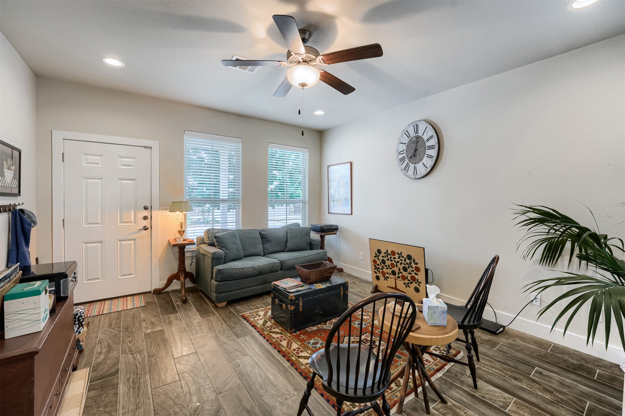 418 High Tech Drive Georgetown, TX 78626 - Photo 3 of 34 Living area featuring wood-finish tile flooring, recessed lighting, and a ceiling fan with integrated lighting
