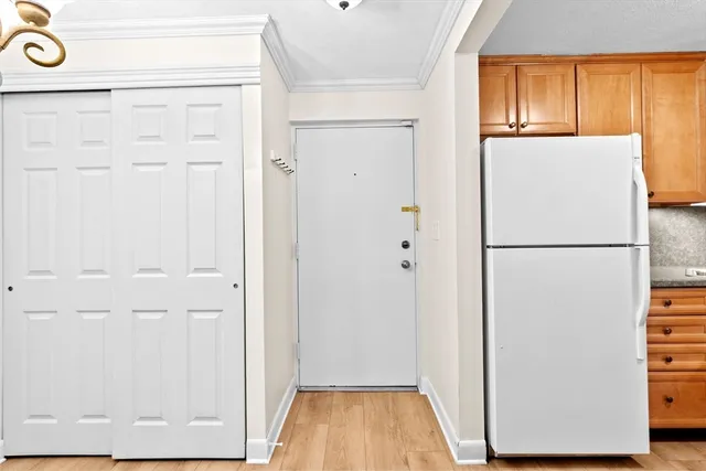 a view of walk in closet with window
