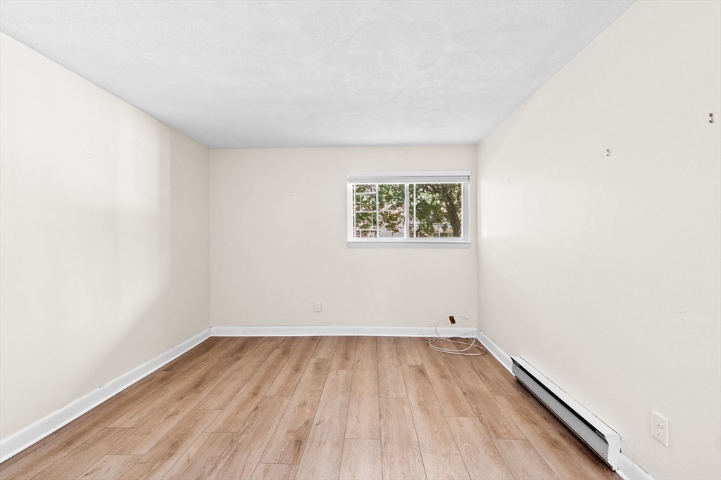 79 Fountain Lane, Unit 3 Weymouth, MA 02190 - Photo 16 of 29 an empty room with a window