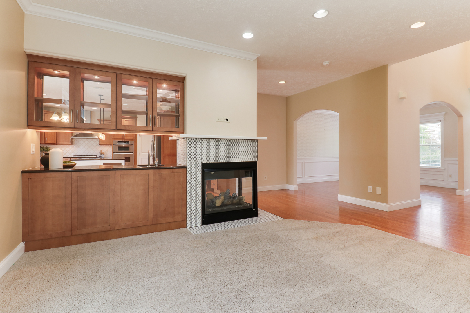 69 Brookstone Circle Bloomington, IL 61704 - Photo 16 of 63 a view of a kitchen a fireplace and a window