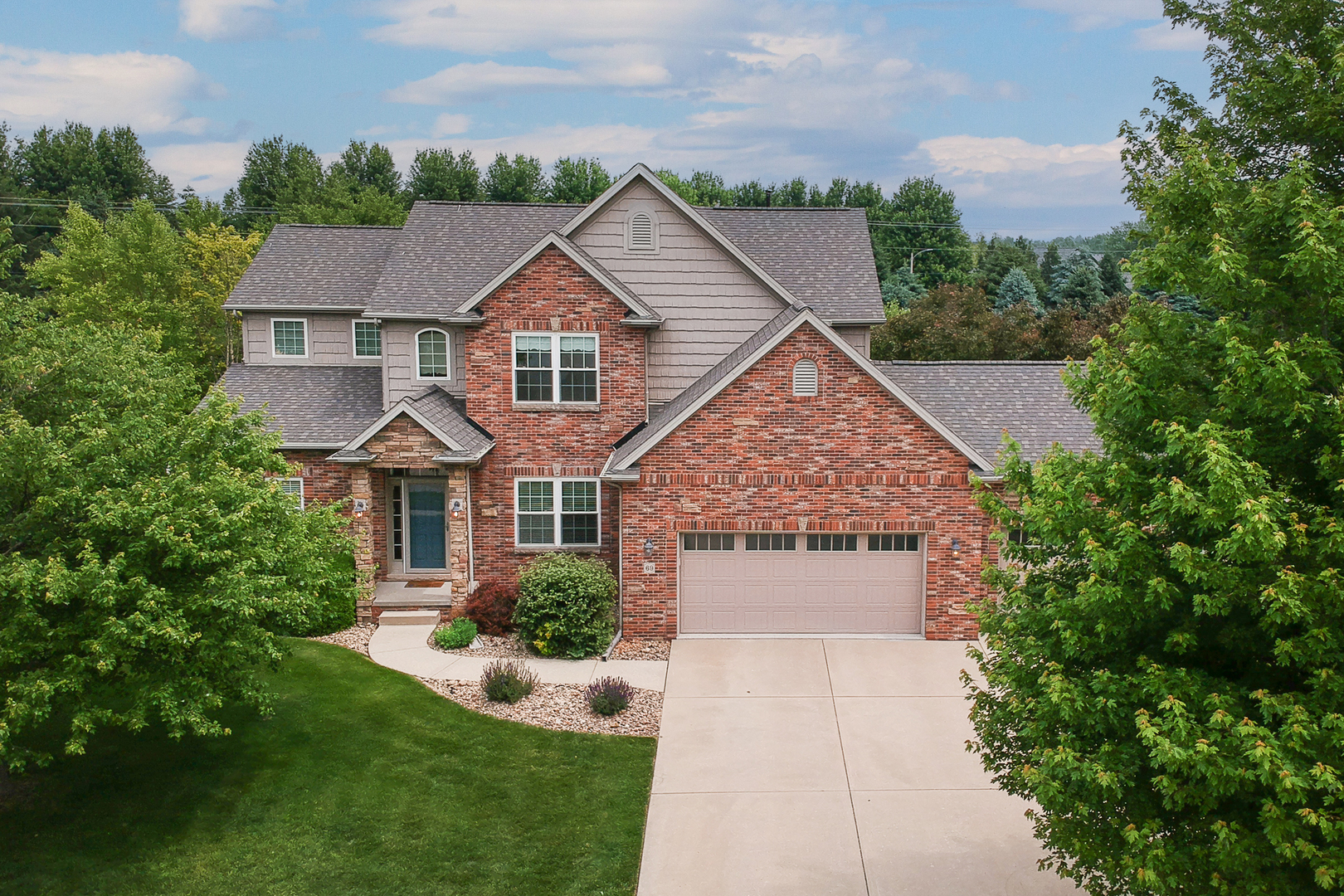 69 Brookstone Circle Bloomington, IL 61704 - Photo 3 of 63 a aerial view of a house with a yard