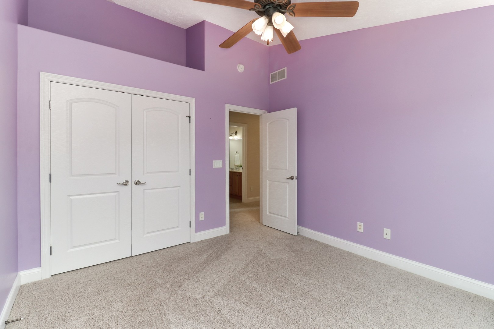 69 Brookstone Circle Bloomington, IL 61704 - Photo 39 of 63 a view of a livingroom with a chandelier fan