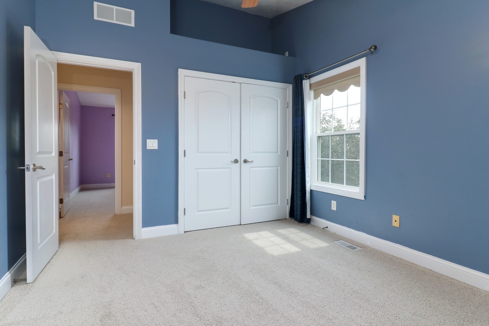 69 Brookstone Circle Bloomington, IL 61704 - Photo 41 of 63 an empty room with windows and closet