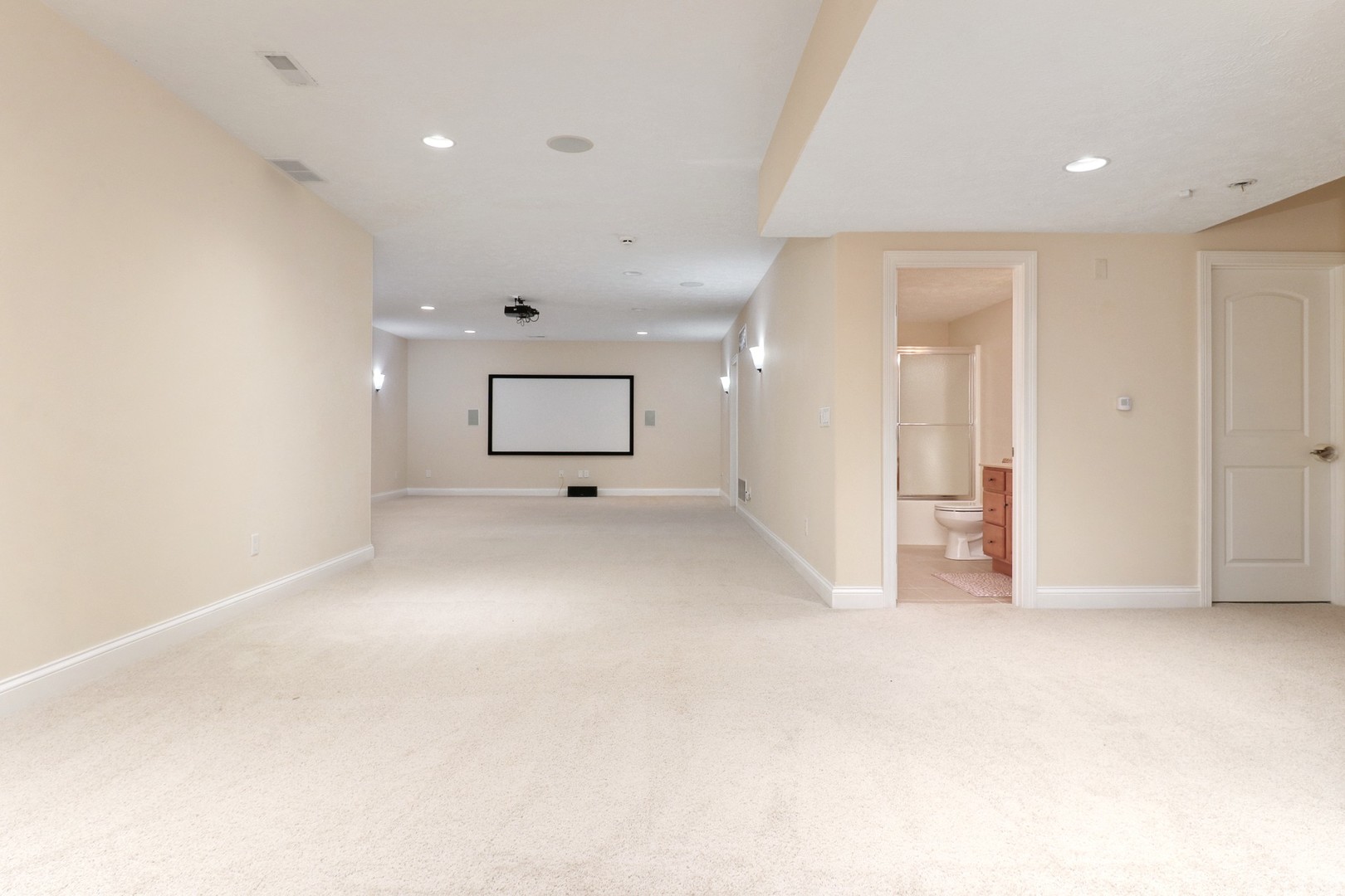 69 Brookstone Circle Bloomington, IL 61704 - Photo 43 of 63 an empty room with wooden floor and mirror