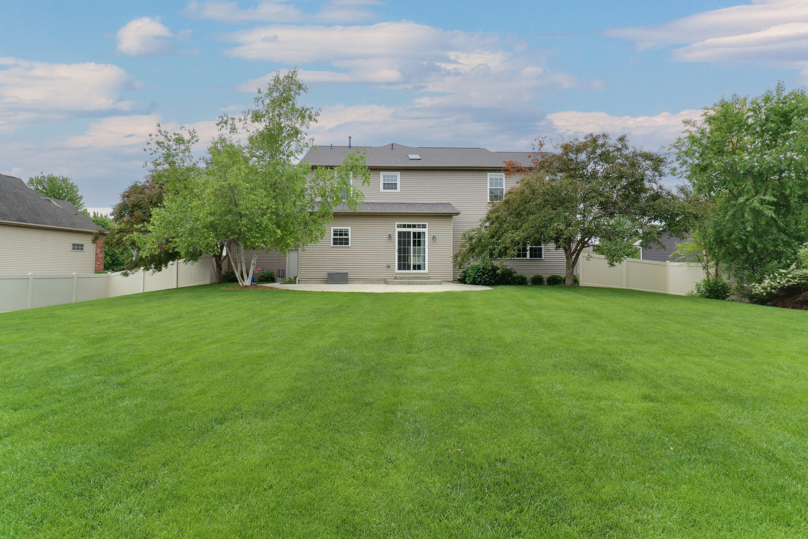 69 Brookstone Circle Bloomington, IL 61704 - Photo 55 of 63 a house view with a garden space