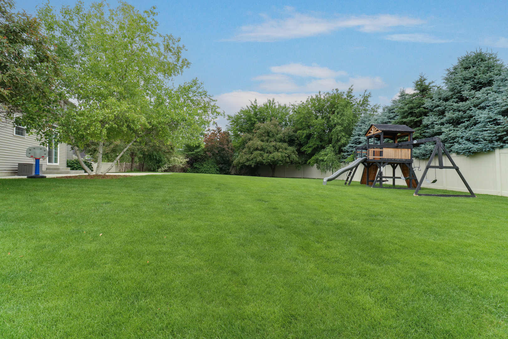 69 Brookstone Circle Bloomington, IL 61704 - Photo 62 of 63 a view of an outdoor space and a yard