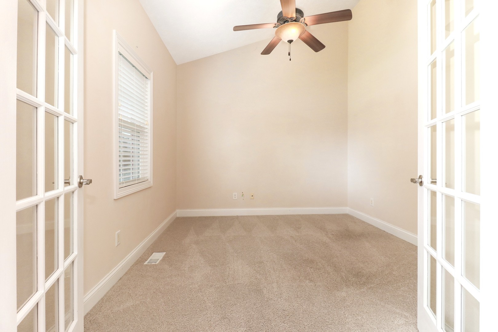 69 Brookstone Circle Bloomington, IL 61704 - Photo 10 of 63 a view of an empty room with a window