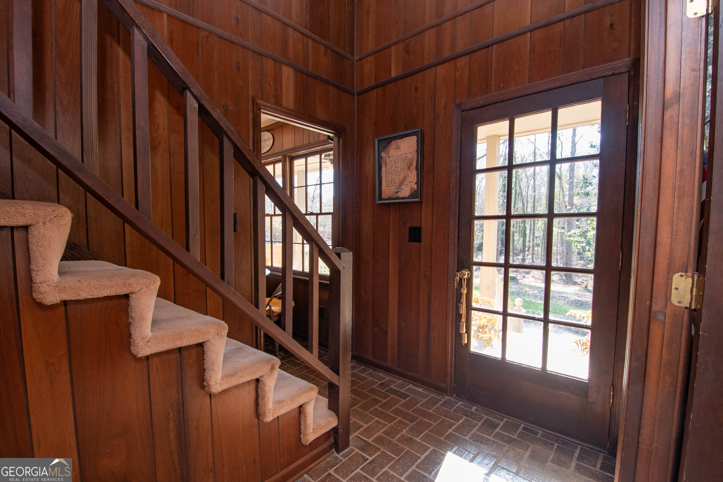 151 Evans Road Milner, GA 30257 - Photo 30 of 53 a view of entryway and hall with wooden floor