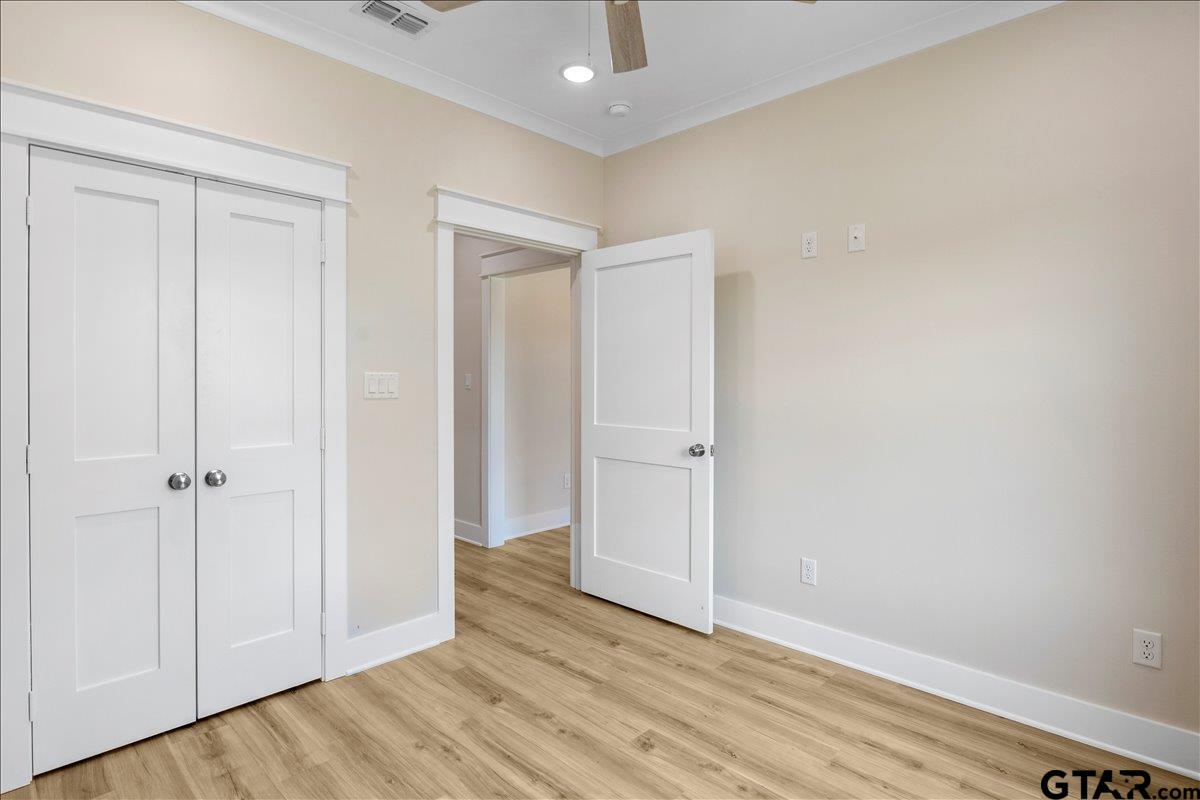 501 County Road 330 Tyler, TX 75708 - Photo 20 of 36 a view of an empty room and wooden floor