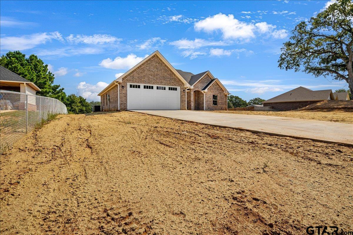 501 County Road 330 Tyler, TX 75708 - Photo 3 of 36 a front view of a house with a yard