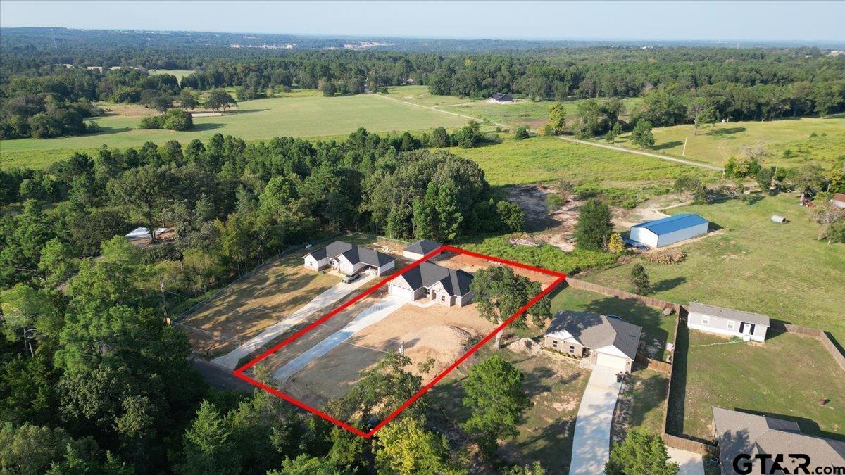 501 County Road 330 Tyler, TX 75708 - Photo 36 of 36 an aerial view of residential houses with outdoor space and pool