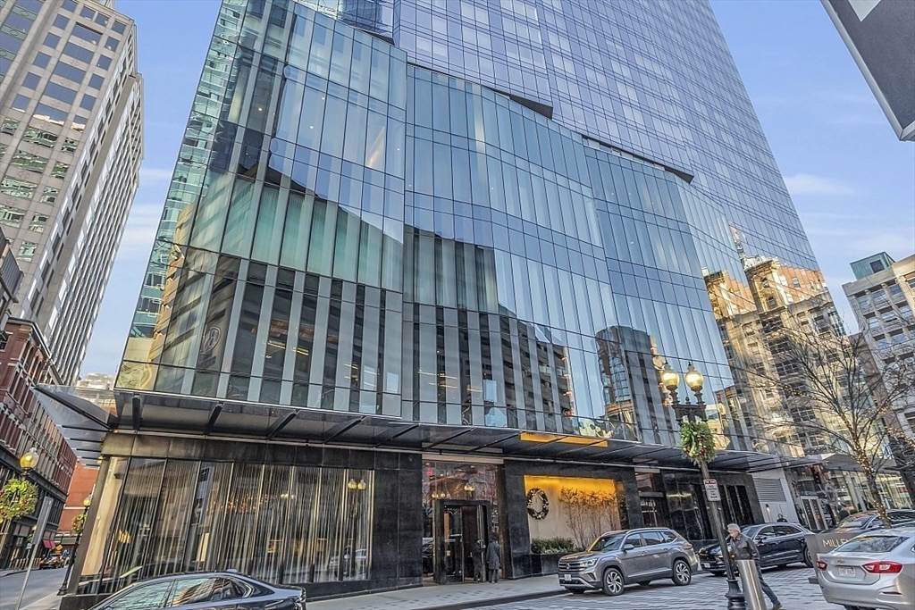 1 Franklin Street, Unit 1602 Boston, MA 02110 - Photo 13 of 14 a front view of a building with glass windows