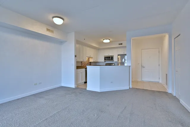 a view of a kitchen with a sink