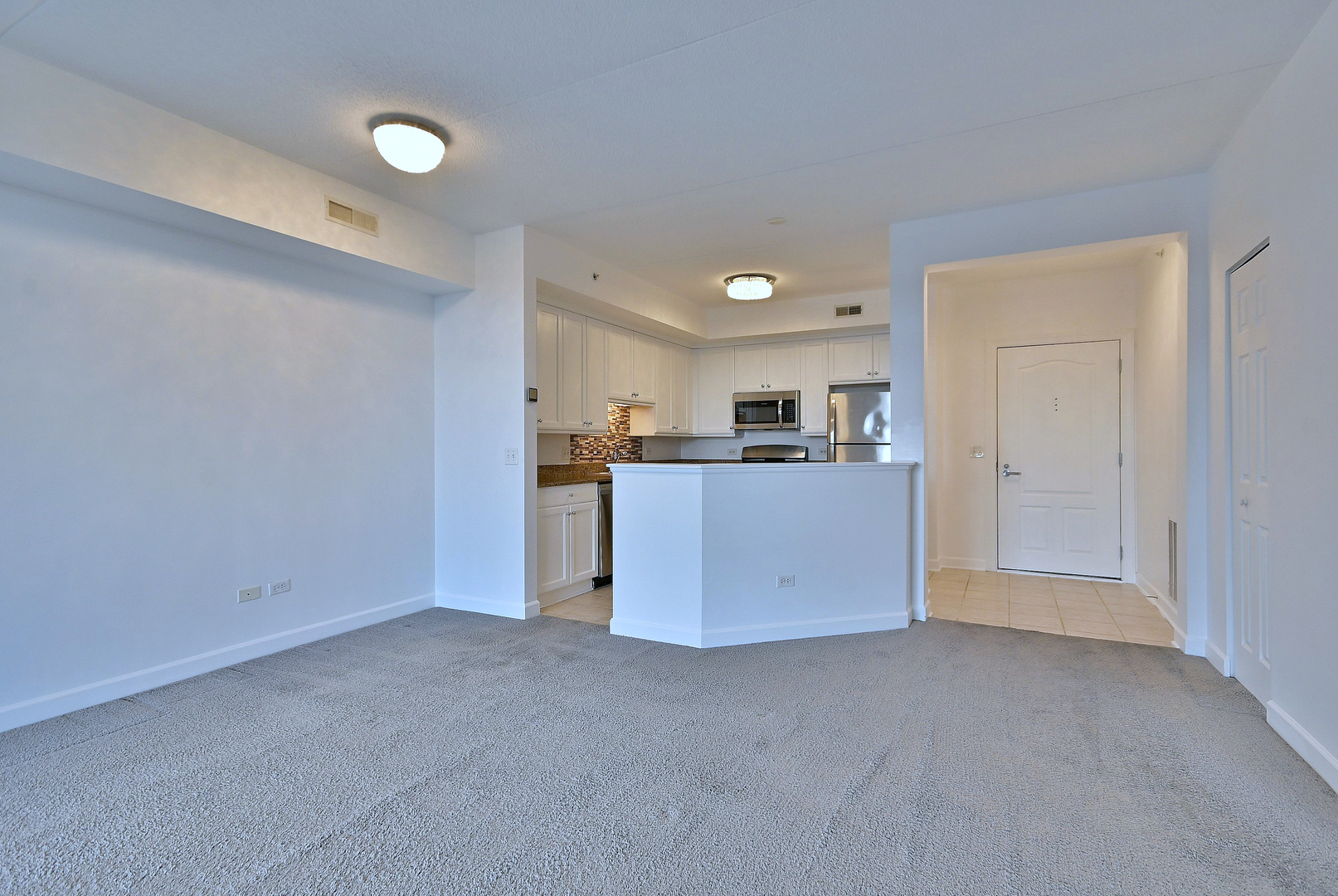 8300 Callie Avenue, Unit 412 Morton Grove, IL 60053 - Photo 11 of 28 a view of a kitchen with a sink