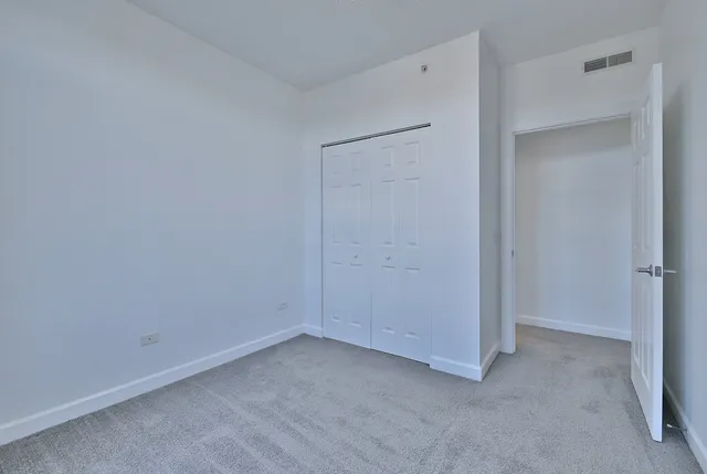 a view of a balcony with city view