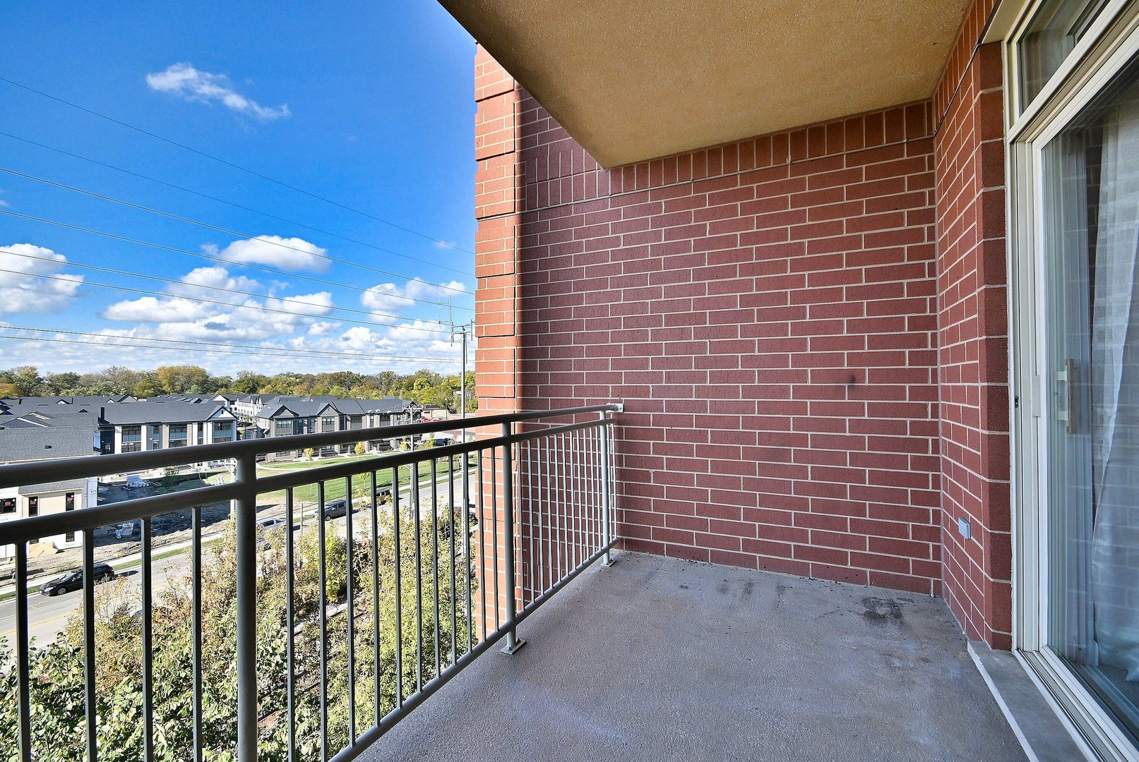8300 Callie Avenue, Unit 412 Morton Grove, IL 60053 - Photo 22 of 28 a view of a balcony with city view