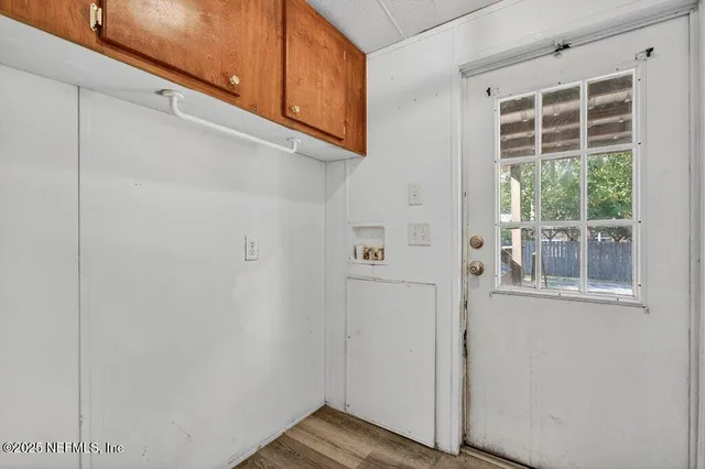 a kitchen with stainless steel appliances granite countertop wooden cabinets and sink