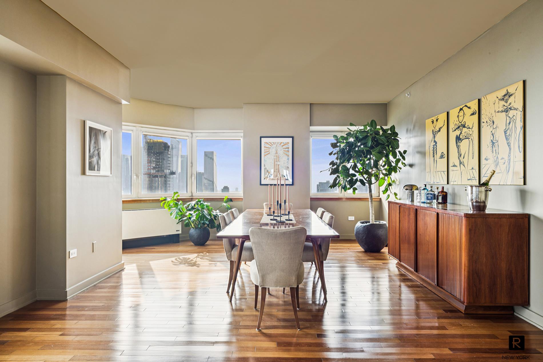 425 5th Avenue, Unit 65A Manhattan, NY 10016 - Photo 4 of 25 a view of a dining room with furniture window and wooden floor