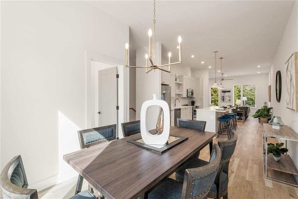 1237 Memorial Drive Southeast, Unit 403 Atlanta, GA 30316 - Photo 15 of 38 a view of a dining room with furniture