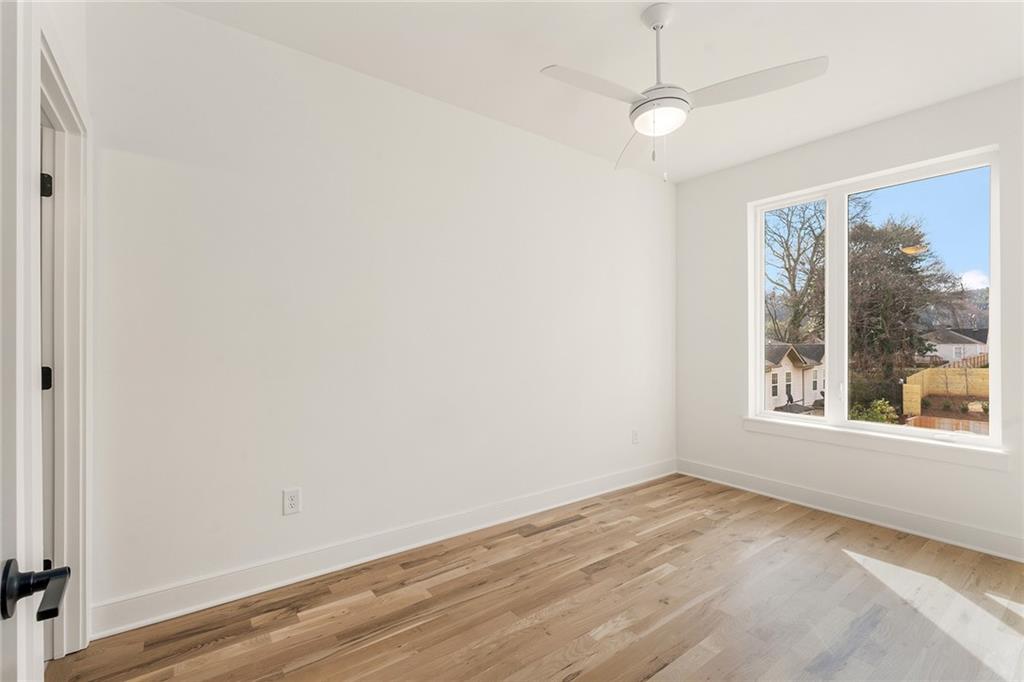 1237 Memorial Drive Southeast, Unit 403 Atlanta, GA 30316 - Photo 20 of 38 an empty room with a window