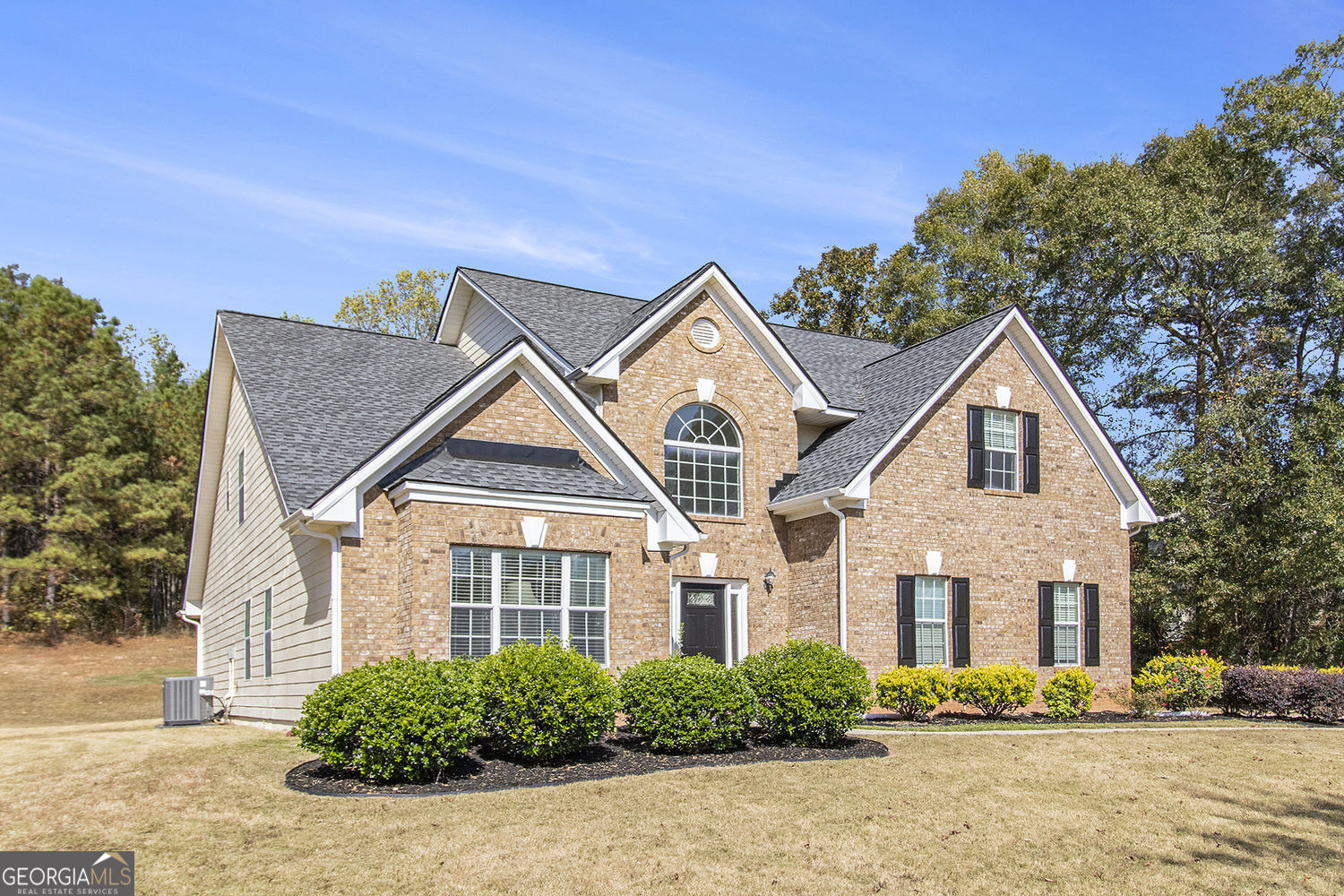 48 Garden View Terrace Newnan, GA 30263 - Photo 1 of 25 a front view of a house with a yard