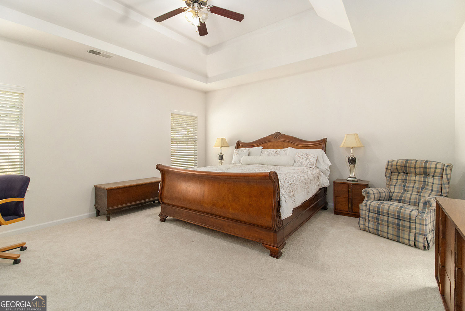 48 Garden View Terrace Newnan, GA 30263 - Photo 16 of 25 a bedroom with a bed and a chandelier