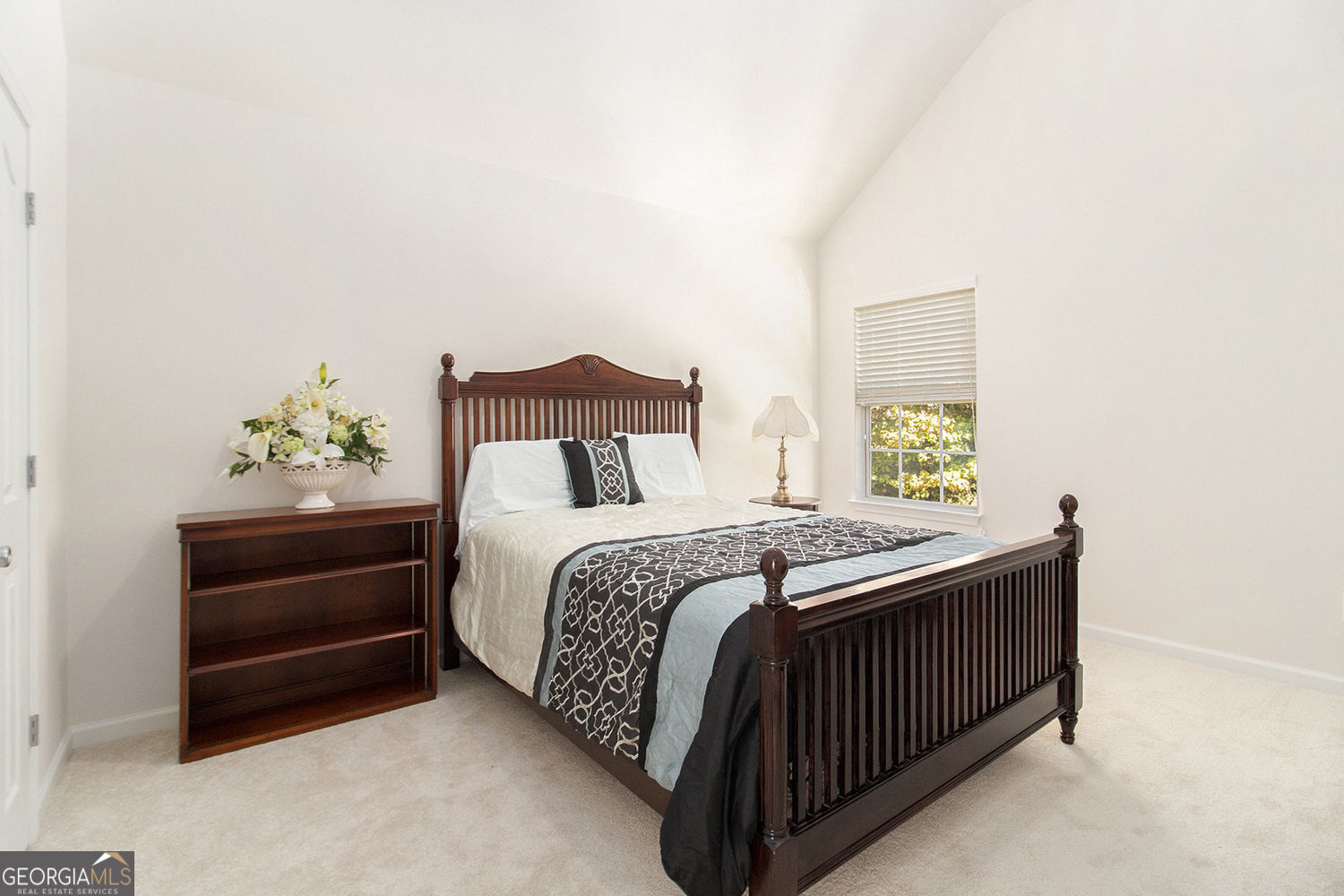 48 Garden View Terrace Newnan, GA 30263 - Photo 19 of 25 a bed sitting in a bedroom next to a window
