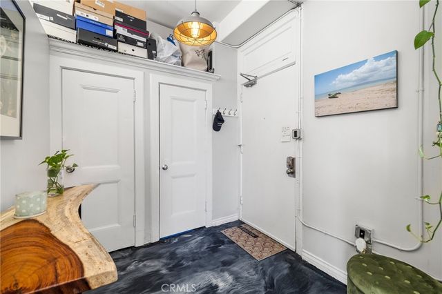 a bedroom with a bed and a table