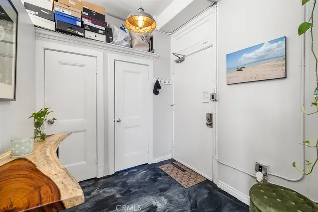 a bedroom with a bed and a table