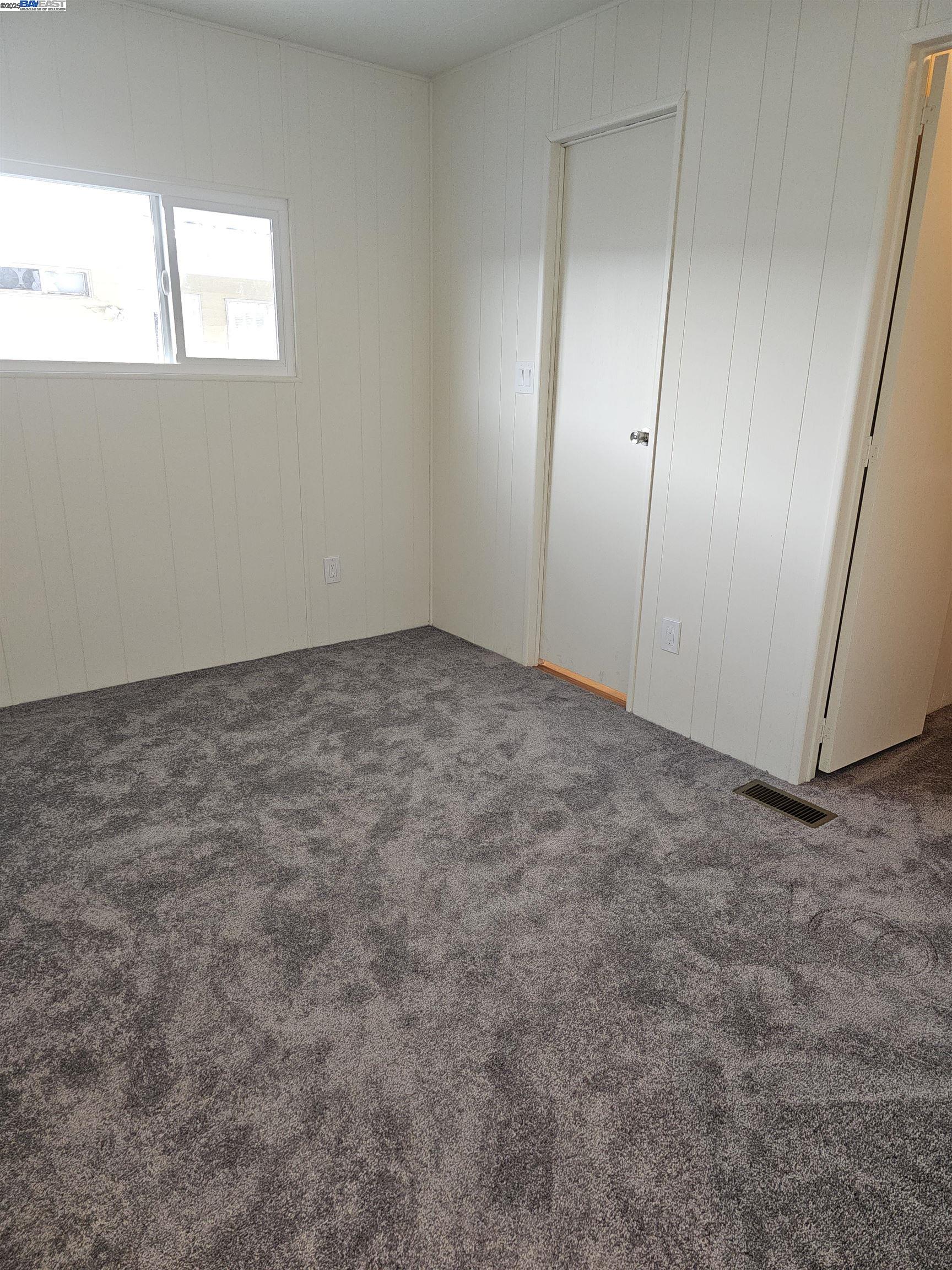 4141 Deep Creek Road, Unit 106 Fremont, CA 94555 - Photo 15 of 37 a view of an empty room and a window