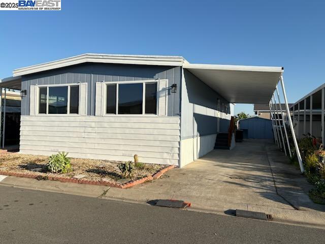 4141 Deep Creek Road, Unit 106 Fremont, CA 94555 - Photo 21 of 37 a backyard of a house with table and chairs