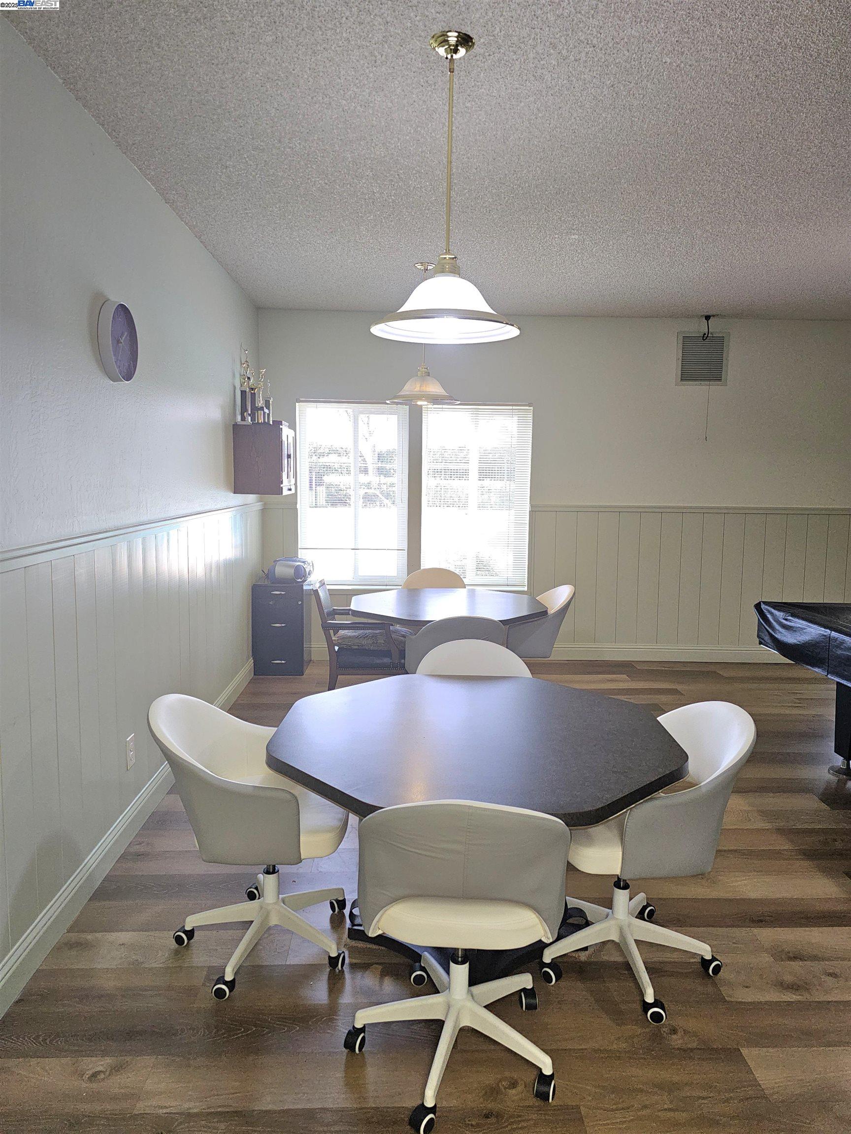 4141 Deep Creek Road, Unit 106 Fremont, CA 94555 - Photo 31 of 37 a view of a dining room with furniture and a window