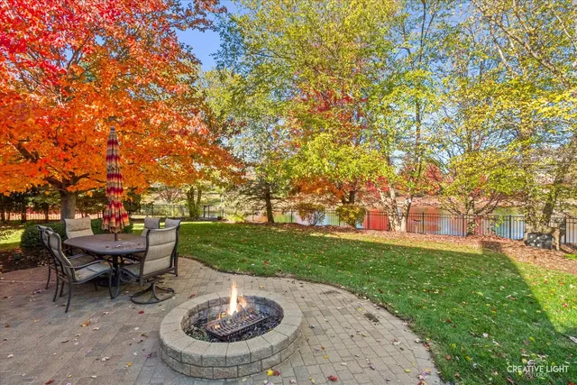 a sign that is sitting in front of a house