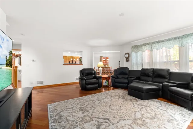 a living room with furniture and a couch