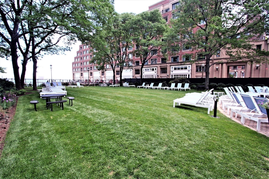 85 East India Row, Unit 15E Boston, MA 02110 - Photo 19 of 20 a view of a park with large trees