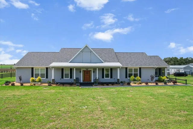a front view of a house with patio